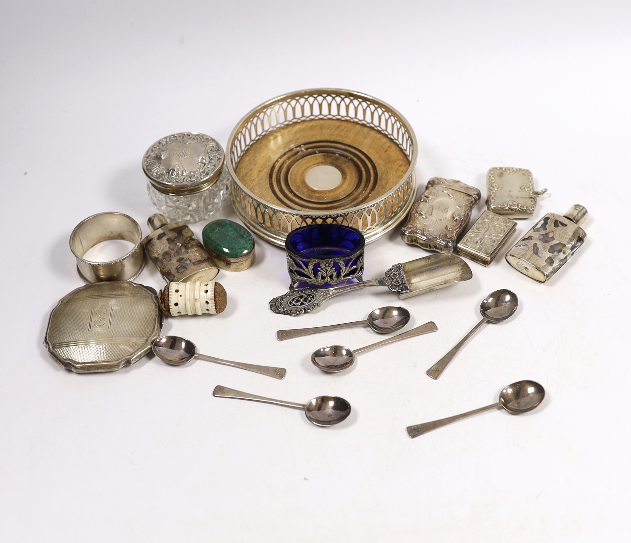 A modern silver mounted wine coaster, a silver compact, two vesta cases, an early Victorian silver vinaigrette, Taylor & Perry, Birmingham, 1839, 40mm, six silver coffee spoons and other sundry silver or white metal item